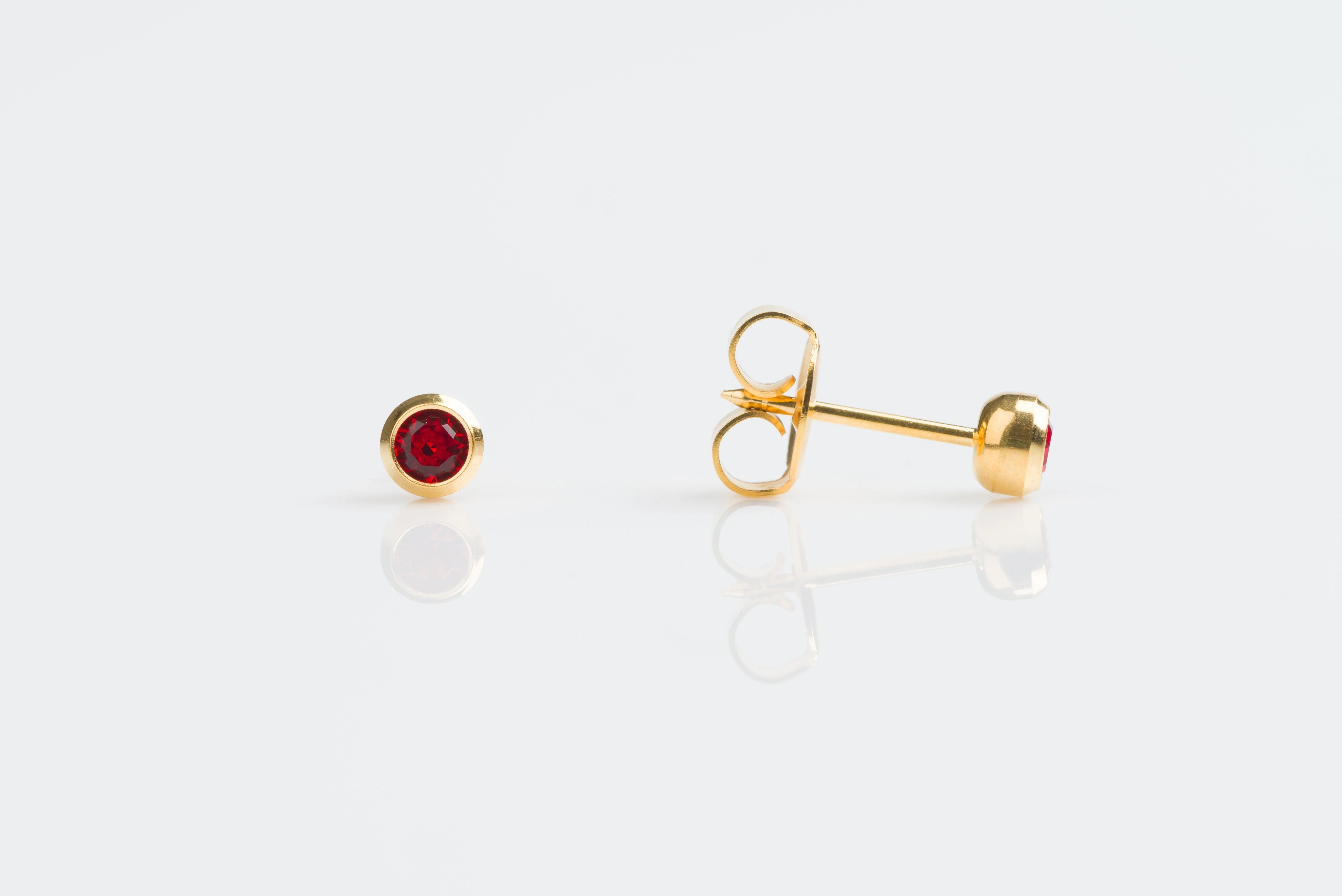 System 75 Bezel Set Piercing Studs - 3mm - July Ruby Crystal - Gold Plated