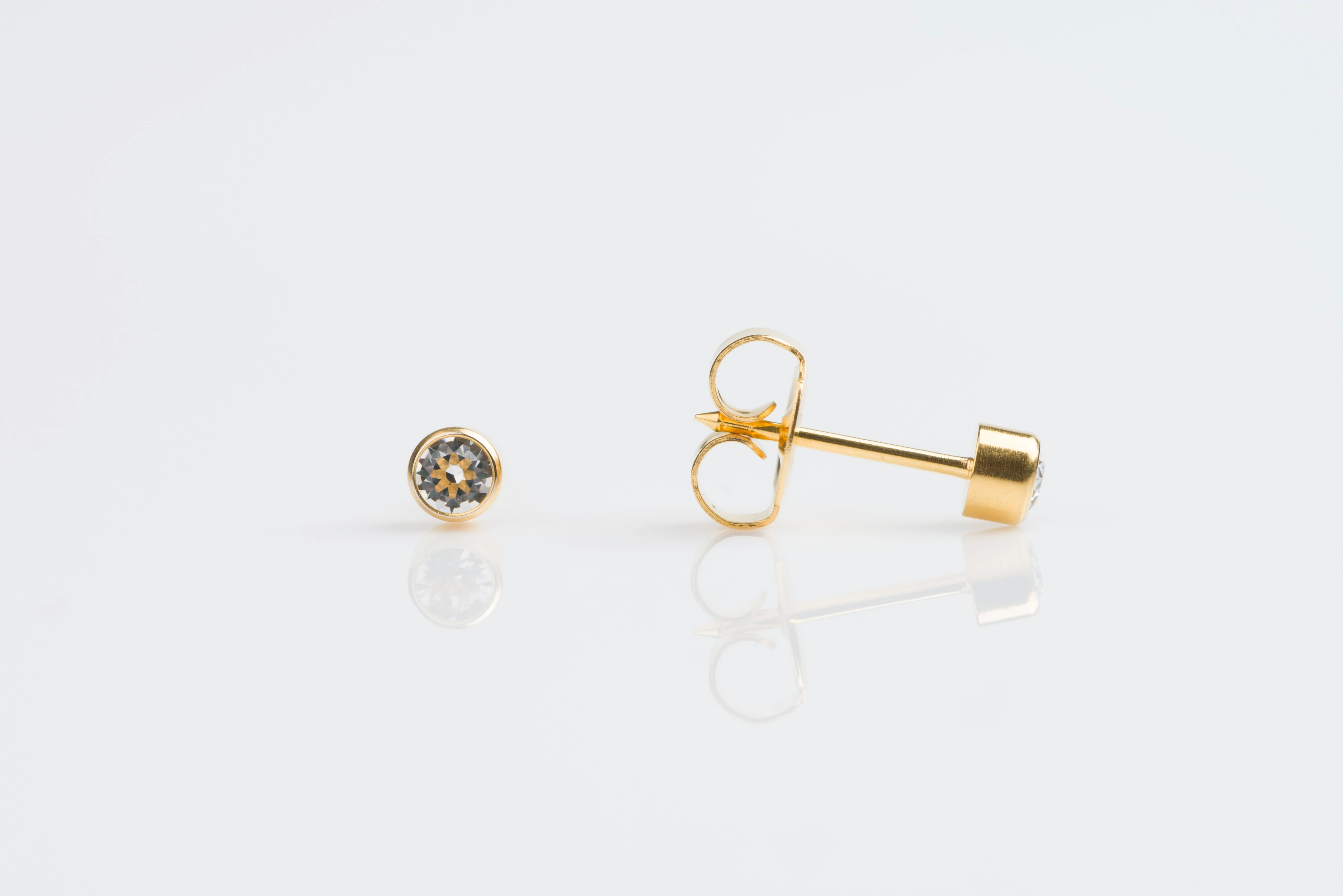 System 75 Bezel Set Piercing Studs - 3mm - April Clear Crystal - 14K Yellow Gold