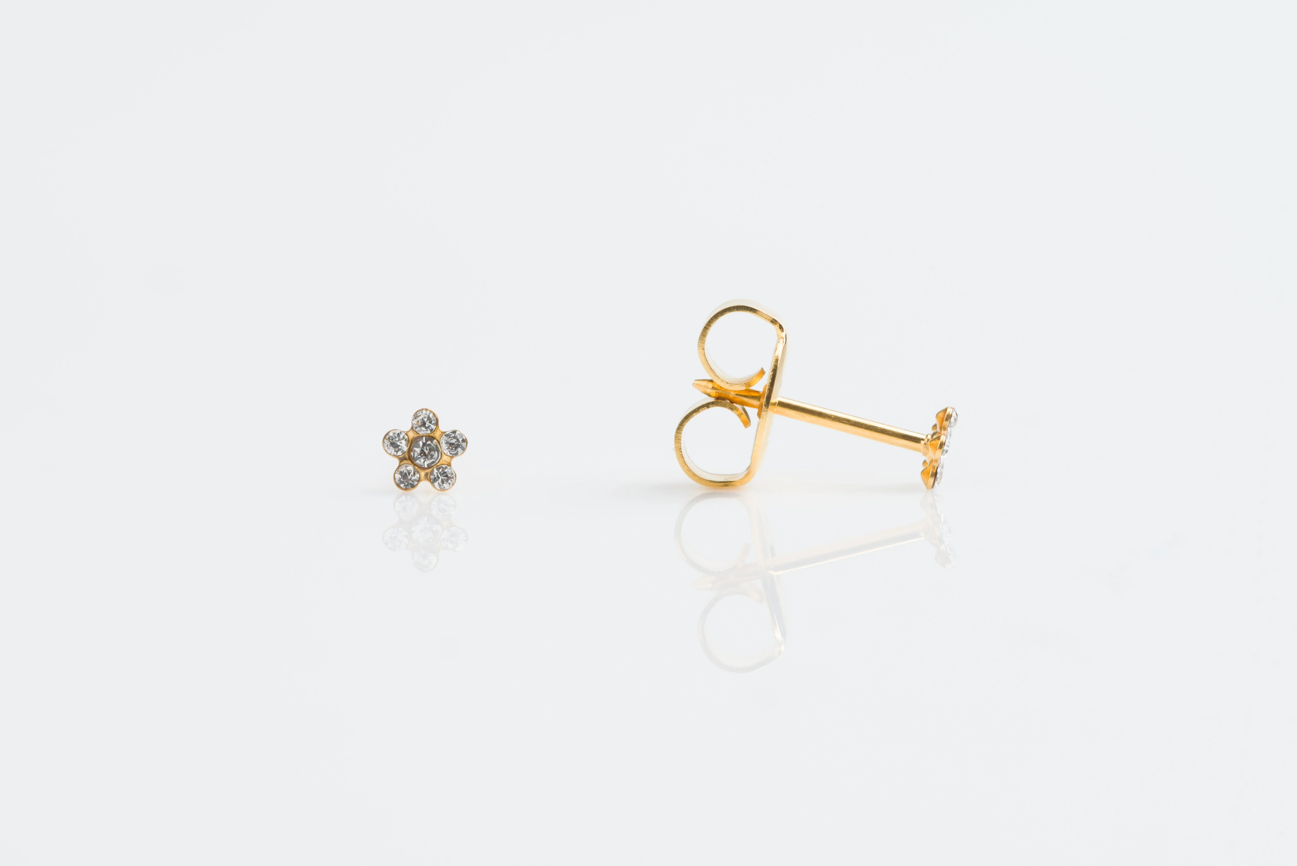 System 75 Daisy Birthstone Piercing Studs - Clear Crystal - Baby Post - Gold Plated
