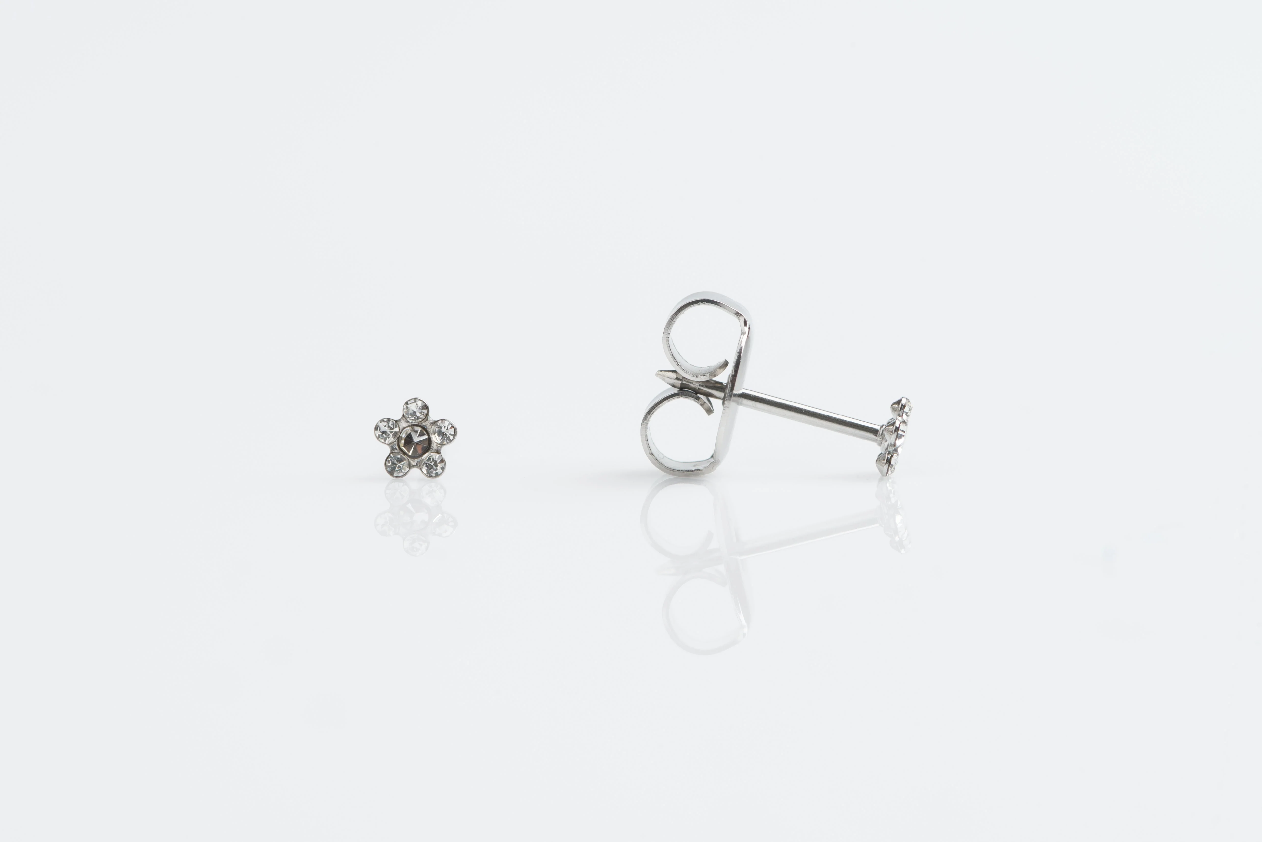System 75 Daisy Birthstone Piercing Studs - Clear Crystal - Baby Post - Stainless Steel